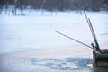 FishermanÃ¢â¬â¢s boat on frozen lake on winter Royalty Free Stock Photo